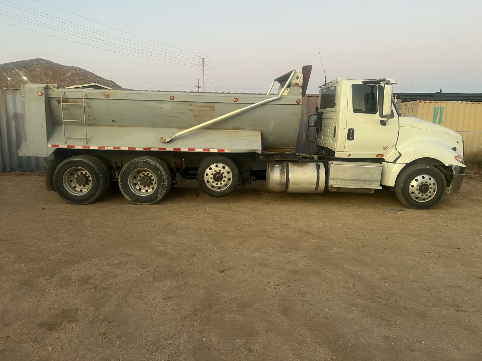 White International super ten dump truck used for dirt export and clean fill hauling in Southern California